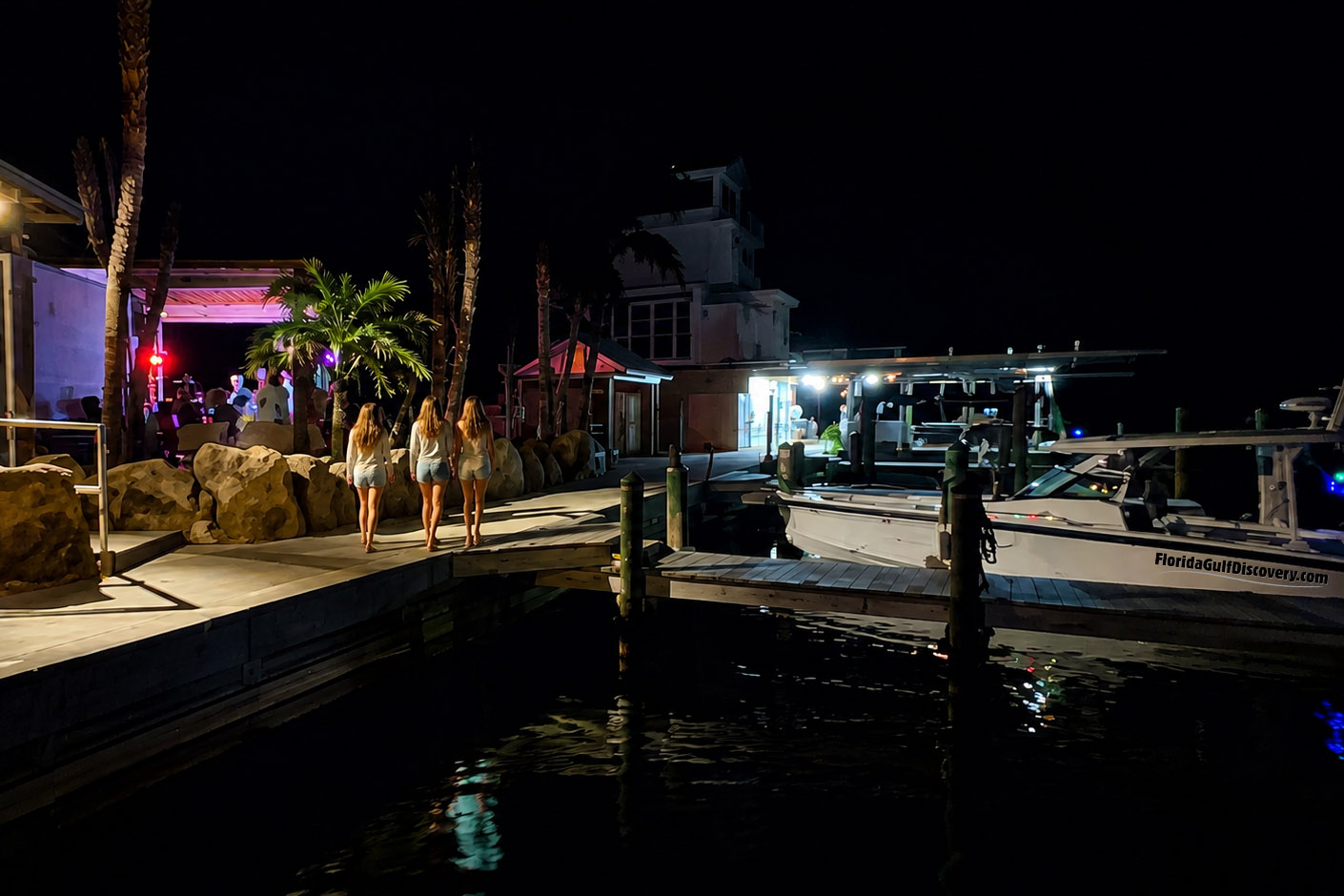 Private Waterfront Dining Cruise at Lighthouse Grill at Stump Pass | Englewood, Florida Florida Gulf Discovery boat docked at Lighthouse Grill at Stump Pass during a private waterfront dining cruise in Englewood, Florida.