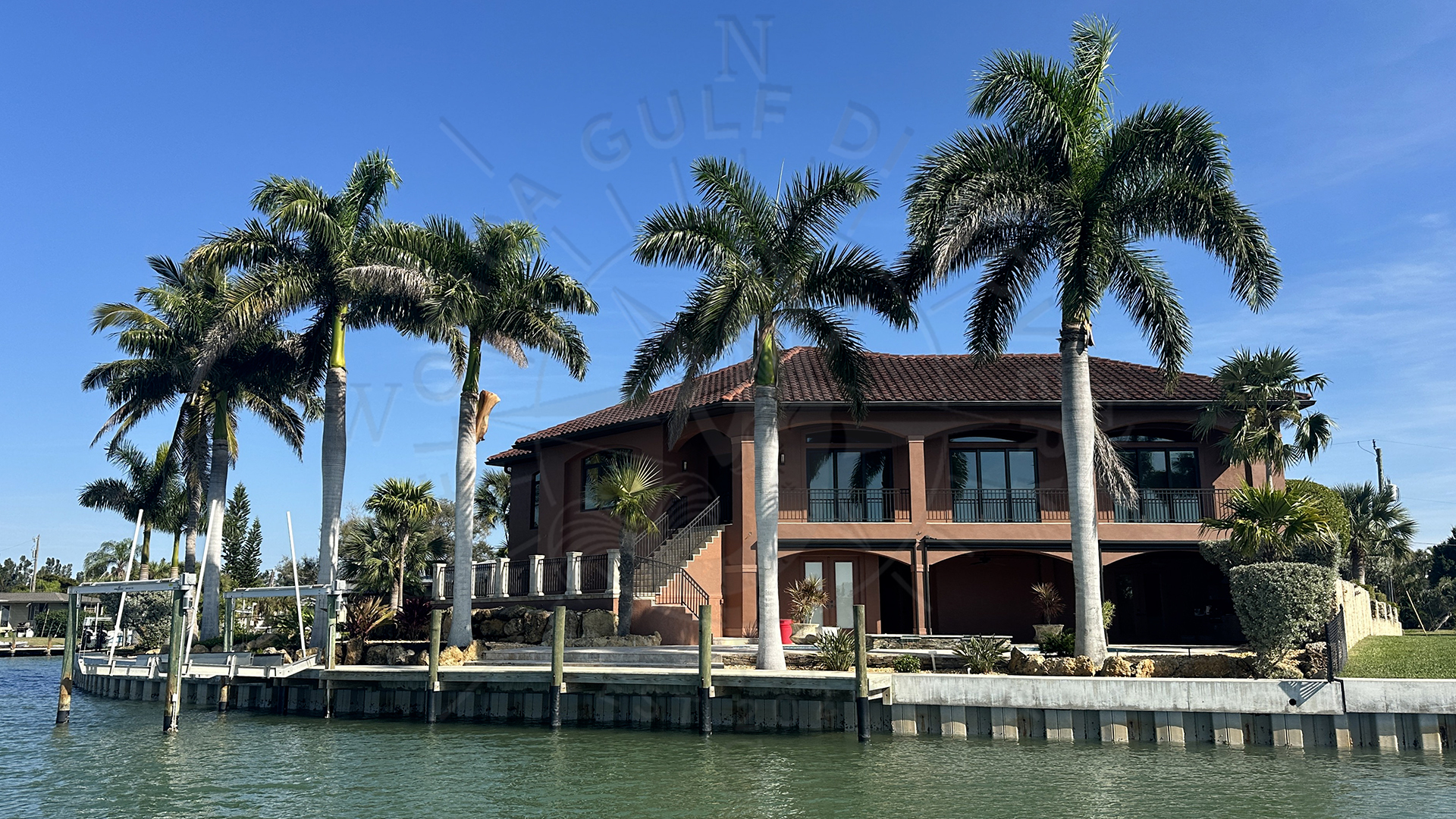 Lyons Bay, Waterfront Home with Palm Trees, Florida Gulf Discovery LLC