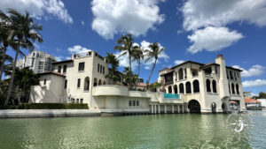 Mediterranean-style building is part of the Village on Venetian Bay, Naples with Florida Gulf Discovery
