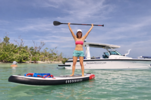 Ski Alley Paddleboarding in a tropical lagoon with Florida Gulf Discovery LLC