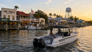 Historic waterfront near Port Boca Grande viewed from private boat during sunset cruise along the Gasparilla Island marina district