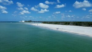 Aerial view of Stump Pass Beach near Milton Pass in September 2025 with calm Gulf waters and sandy shoreline in Southwest Florida