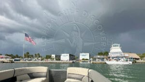 Storm clouds over Stump Pass Marina in Southwest Florida viewed from a boat near Englewood and Placida