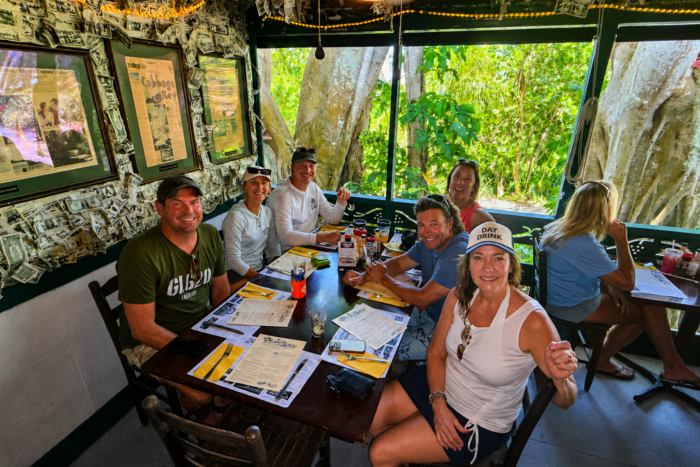 Lunch at Cabbage Key Restaurant | Private Boat Tour Experience Guests enjoying lunch inside the famous Cabbage Key Restaurant during a private boat tour with Florida Gulf Discovery LLC.