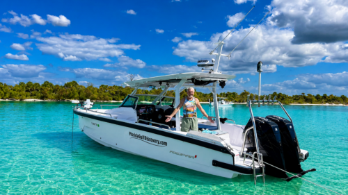 Captain Pavel aboard the Axopar 29 during a private boat tour in the shallow waters of Southwest Florida.
