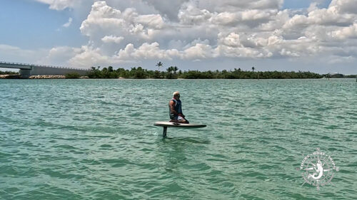 Captain Pavel riding an e-foil at Boca Grande Sandbar in Southwest Florida shortly before an unforgettable dolphin encounter.