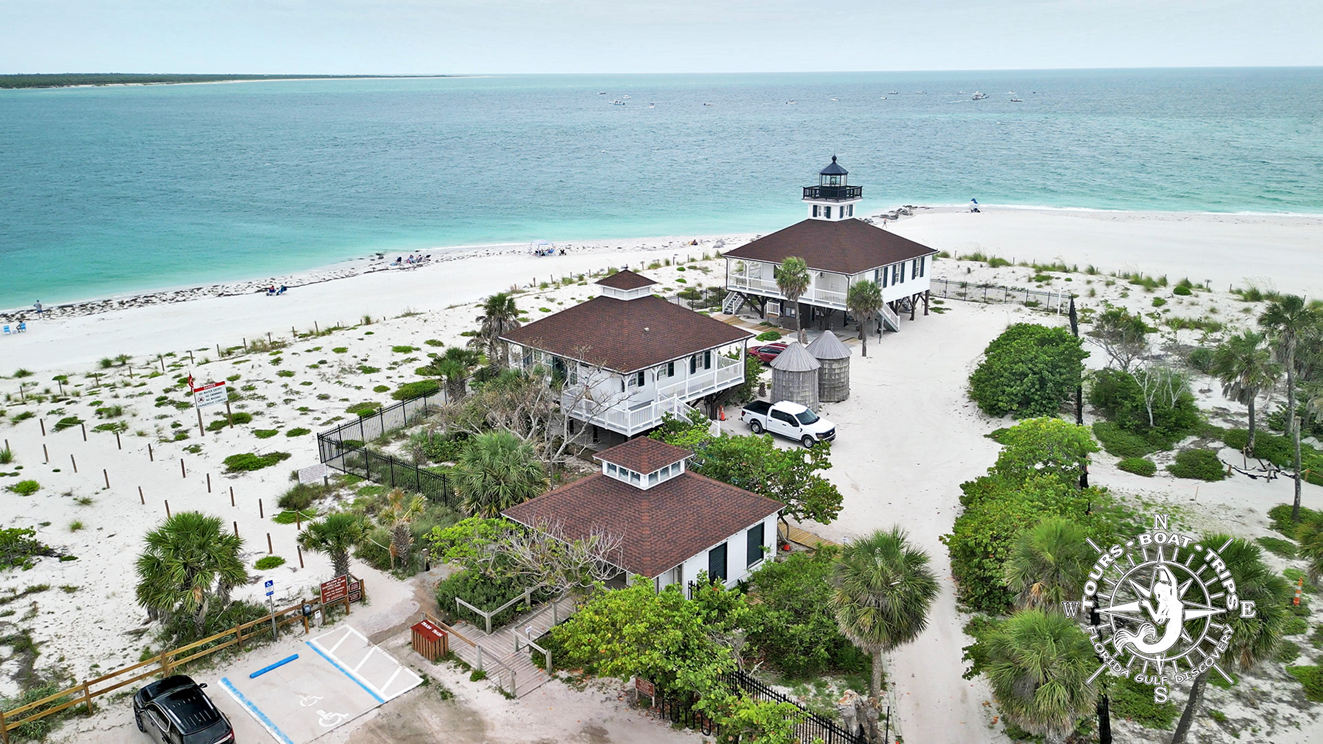 Aerial drone view of the historic Port Boca Grande Lighthouse and museum at the southern tip of Gasparilla Island, Florida