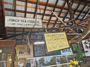 Historic Boca Grande Club tarpon tournament memorabilia displayed inside a marina building on Gasparilla Island, Florida.