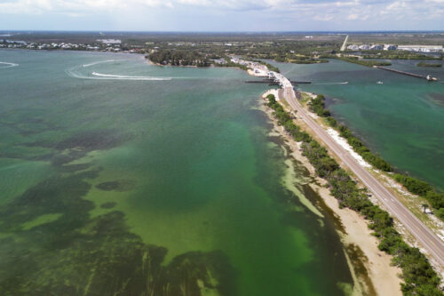 Aerial drone view of the Boca Grande Causeway crossing northern Gasparilla Sound, connecting Placida to Gasparilla Island in Southwest Florida.