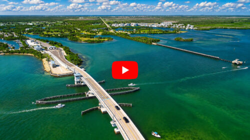 Aerial drone view of the Boca Grande Causeway connecting Placida to Gasparilla Island across Gasparilla Sound in Southwest Florida.