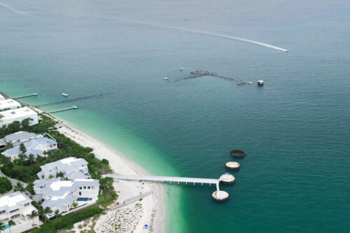 Aerial view of the remaining pilings of the historic Boca Grande phosphate docks off Gasparilla Island, Florida.