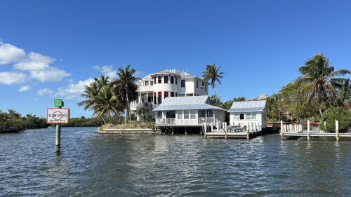 Luxury waterfront home on Calusa Island viewed from the water in Bokeelia, Pine Island, Florida.