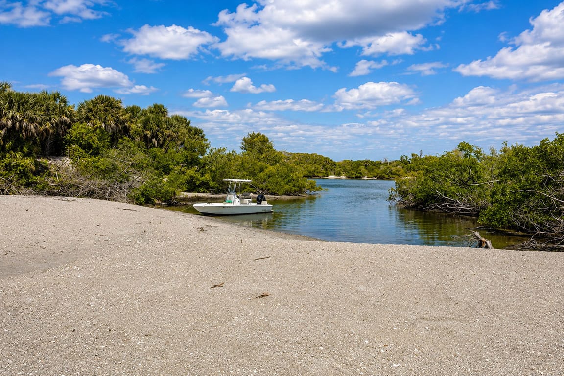 Wide open sand flats at Caspersen Beach after Hurricane Milton in Southwest Florida