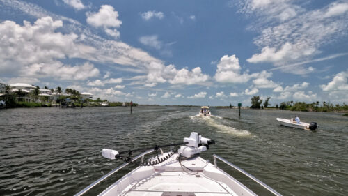 View from the bow of a boat navigating the Gasparilla Marina Channel toward Gasparilla Sound near Placida, Florida.