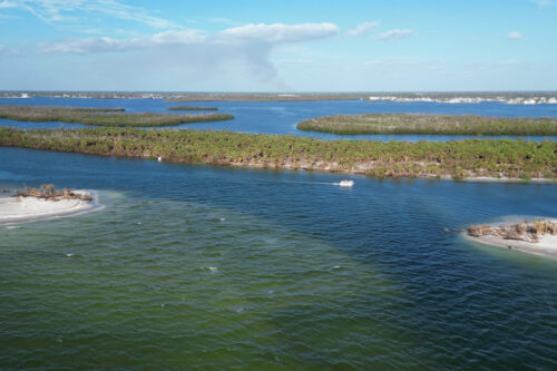 Drone view of Milton Pass in December 2024 showing the new inlet, sandbars, and Gasparilla Sound in Southwest Florida.