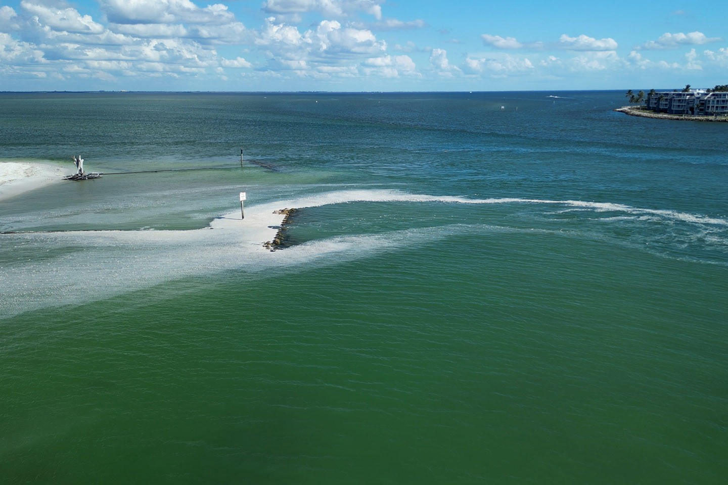 Aerial view of Redfish Pass at the southern end of North Captiva Island, connecting Pine Island Sound with the Gulf of America.