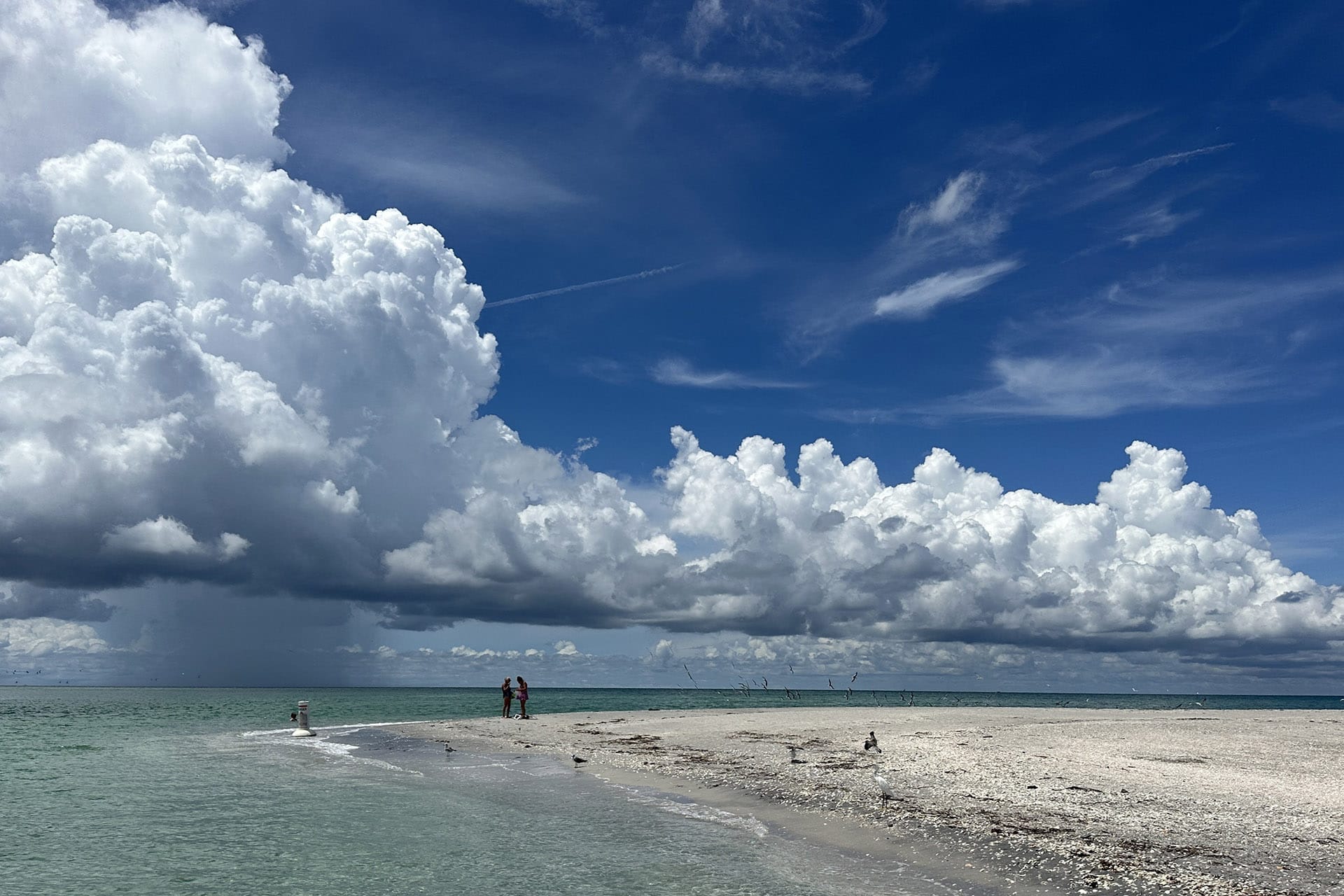 Storm clouds over the Stump Pass sandbar in Southwest Florida