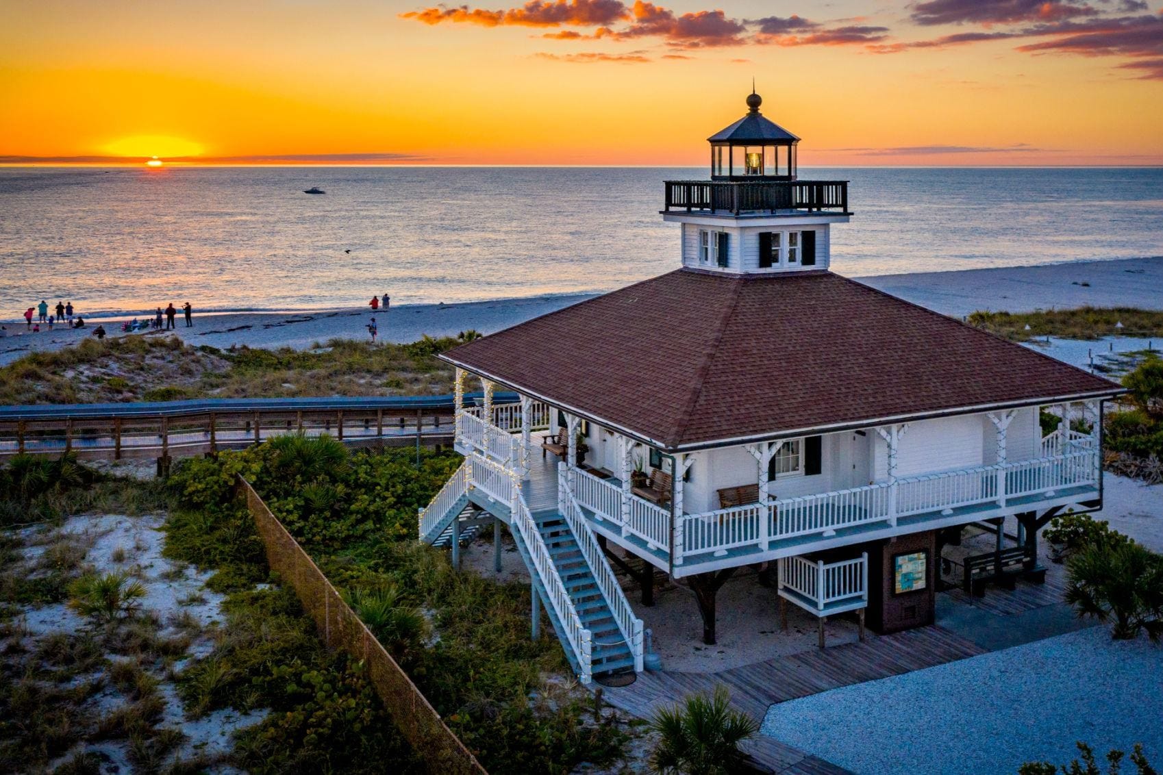 Boca Grande Lighthouse at sunset on Gasparilla Island Florida during a private sunset boat tour