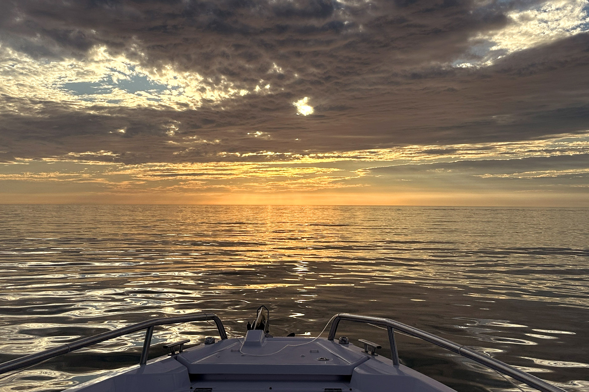 Sunset over Gasparilla Pass in Southwest Florida during a private boat tour with Florida Gulf Discovery