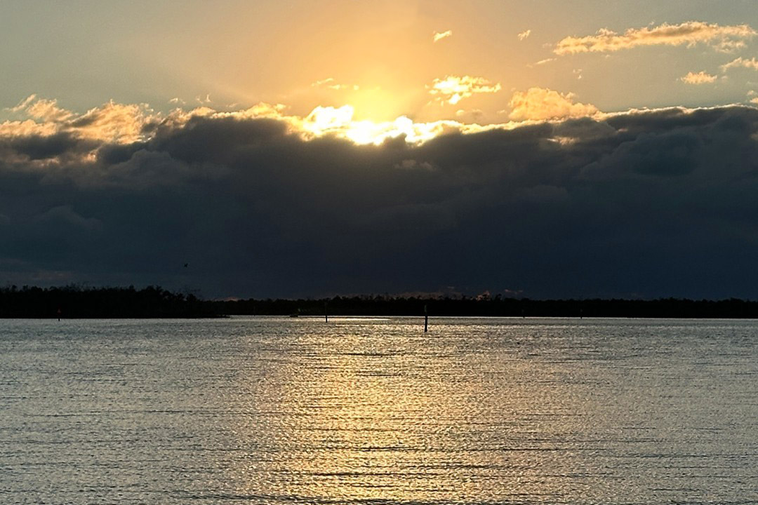 Sunset over Manasota Bay in Southwest Florida during a private sunset boat tour with Florida Gulf Discovery