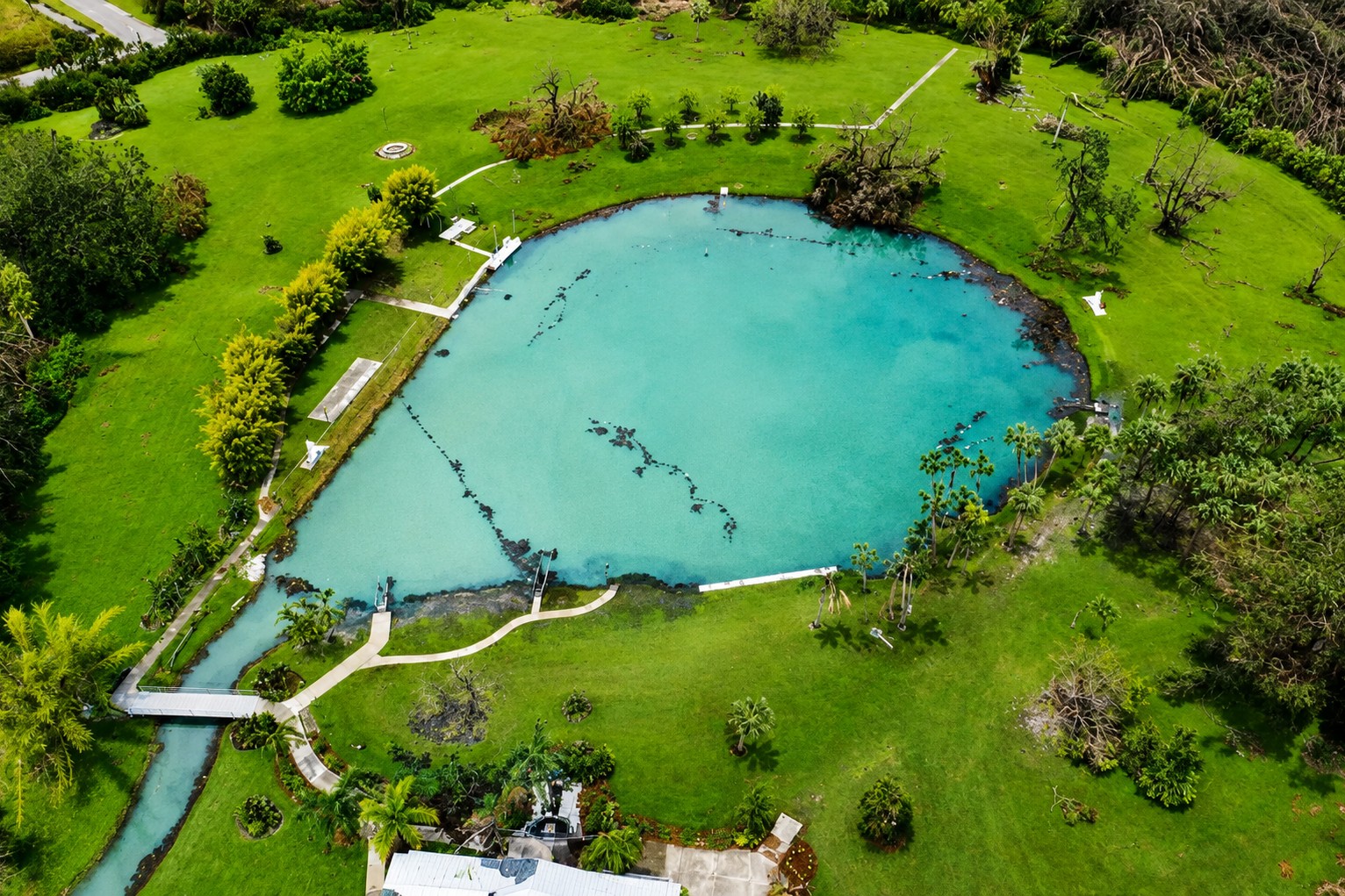 Aerial view of Warm Mineral Springs Park following Hurricane Ian in 2022, North Port, Florida